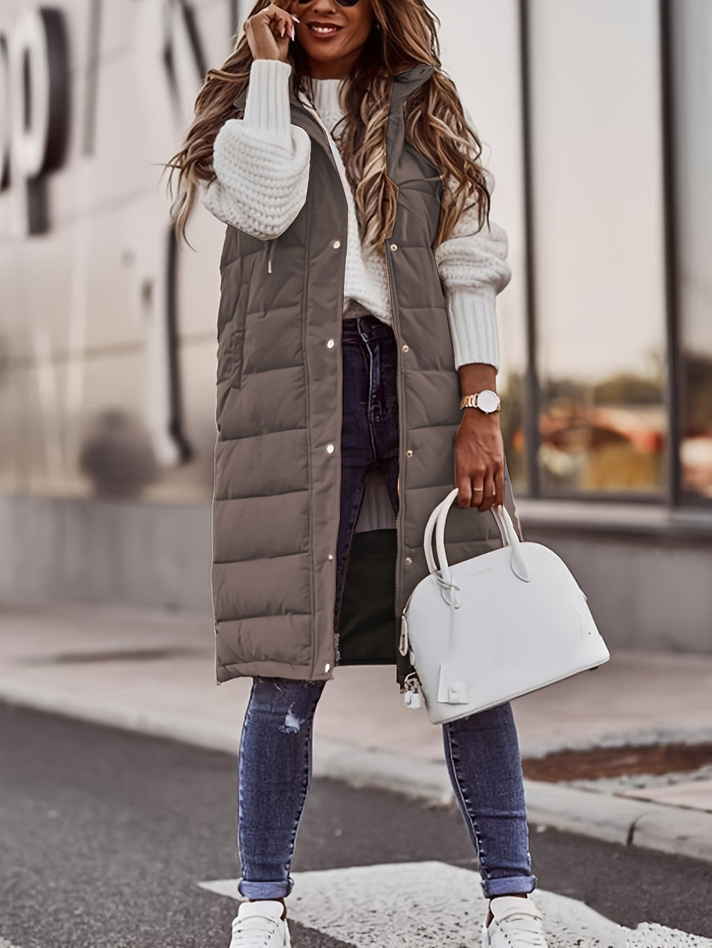 Dames lang gewatteerd vest met capuchon